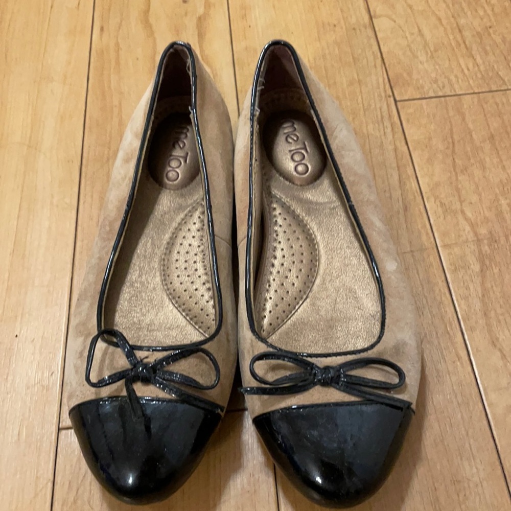 Tan and black cap toe ballet flats